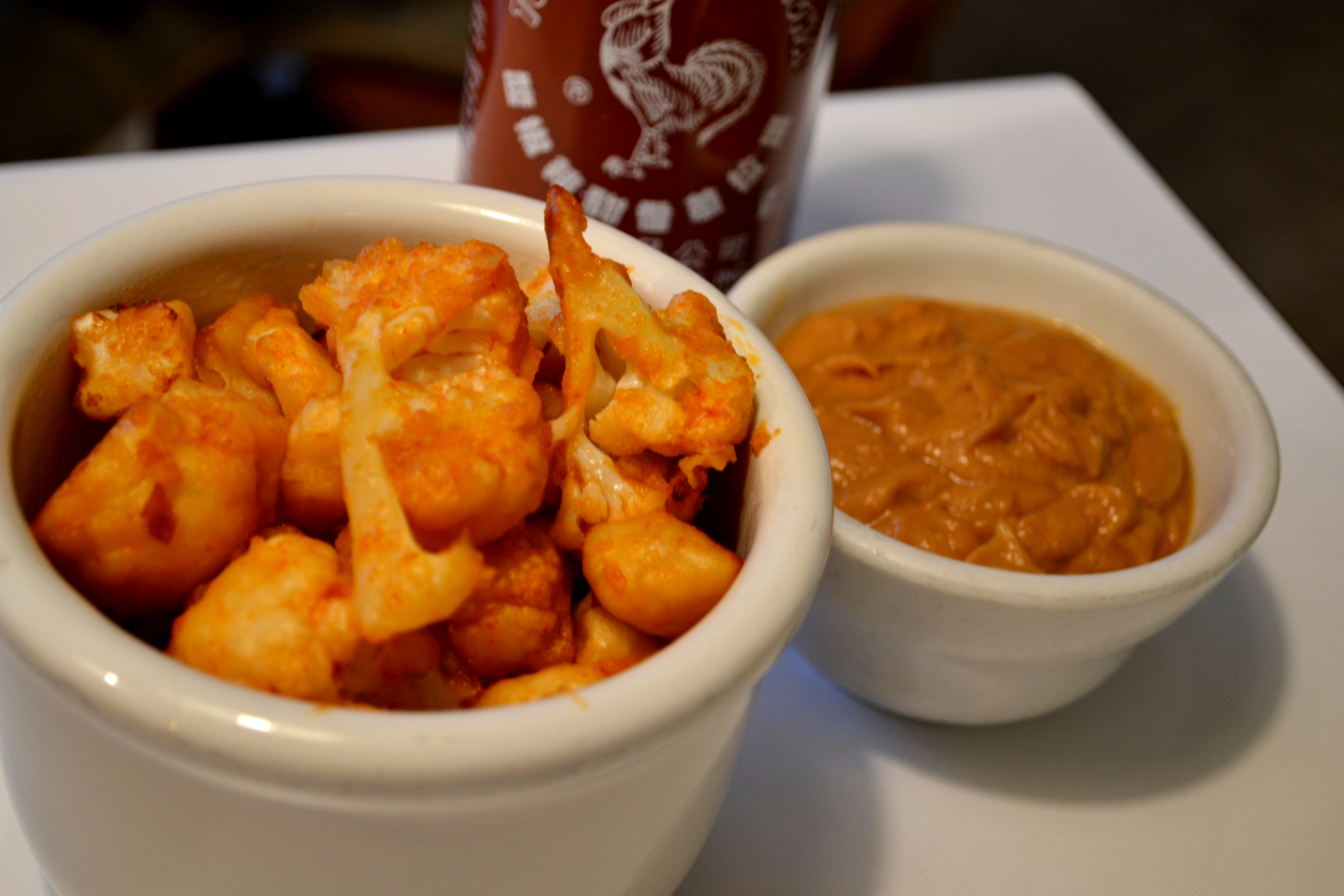 Sriracha Cauliflower Bites with Peanut Ginger Dipping Sauce