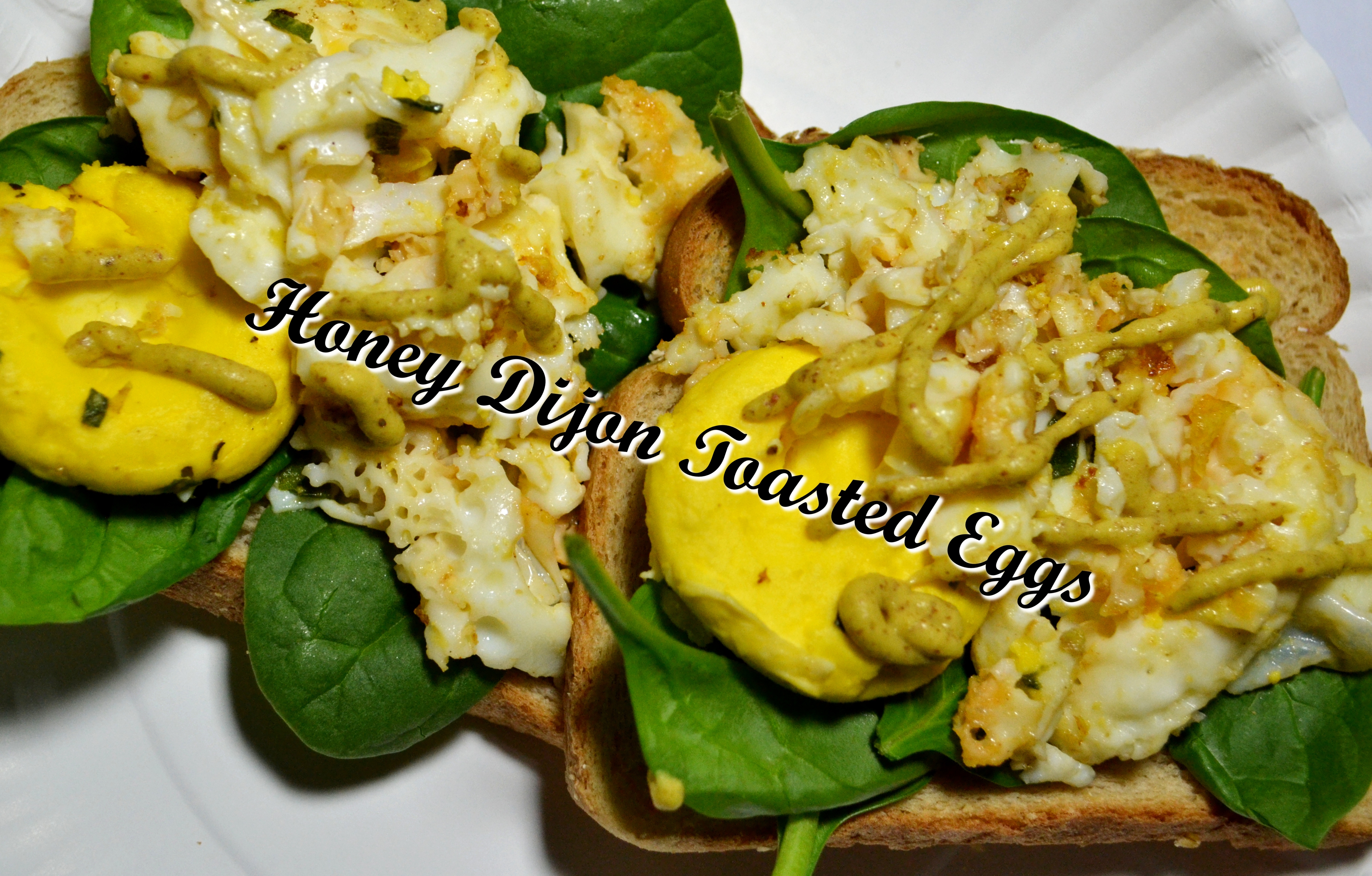 Toasted Honey Dijon Eggs on Spinach